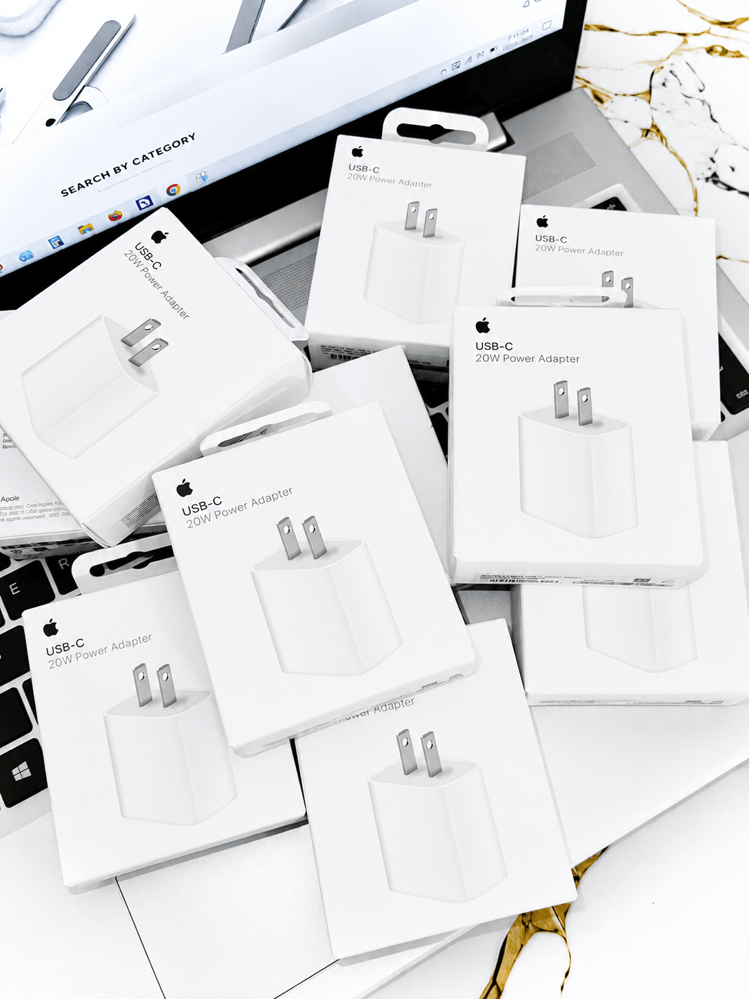 Apple 20W USB-C Power Adapter packaging and accessories